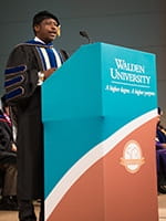 Paul Rusesabagina speaking at Commencement
