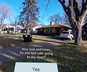 A scene from Walden University's social work virtual reality experience. It shows the exterior of a house and asks the viewer to look and listen and asks if they feel safe going to the door.