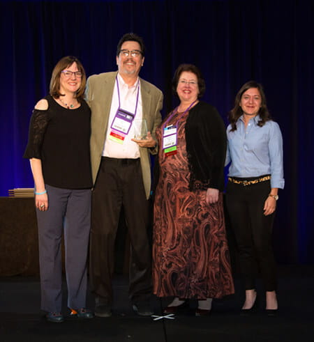 Pictured left to right: Jennifer Rafferty, director of the OLC Institute; Dr. William Schulz III; Dr. Lynn Wilson; and Lynette O'Keefe, director of the OLC Research Center for Digital Learning and Leadership