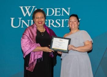 Kelly Murphy receives Walden’s Academic Performance Award from Board of Directors Chair Toni Freeman